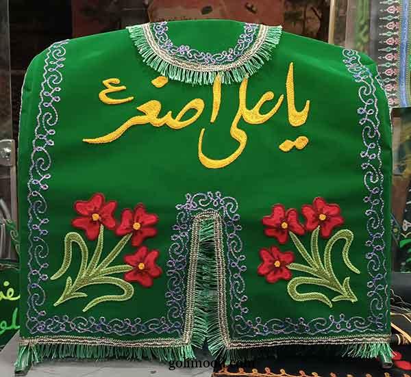 تزیین گهواره علی اصغر | زیبا و احساسی جهت ایده برداری با پارچه‌ سبز و سفید 