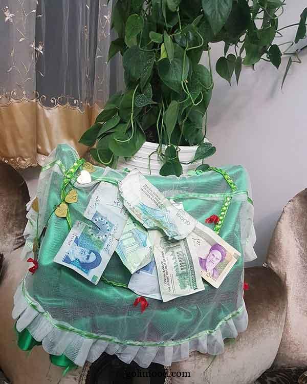 تزیین گهواره علی اصغر | زیبا و احساسی جهت ایده برداری با پارچه‌ سبز و سفید 